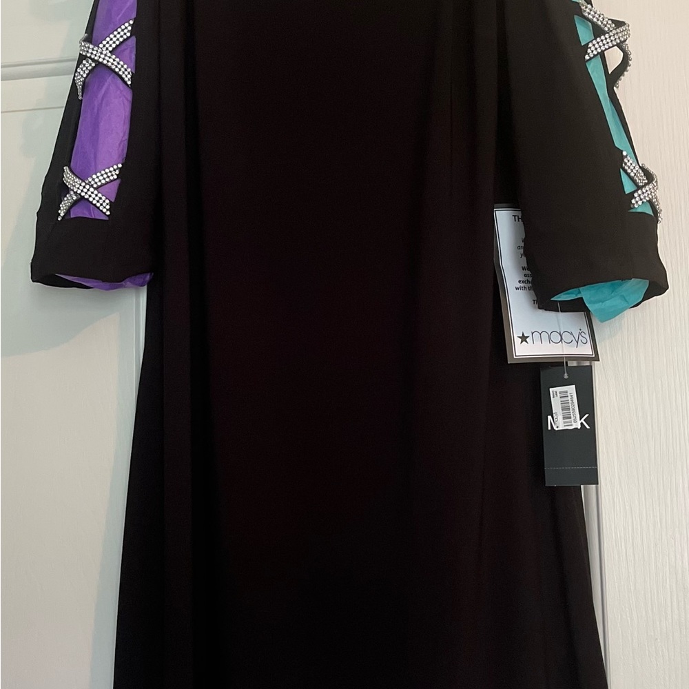 Black dress with rhinestone accents